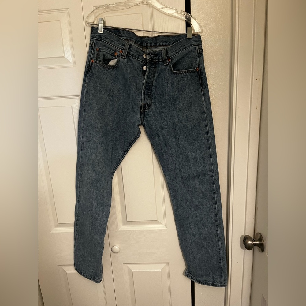 Levi’s 501 high rise, button fly jeans.